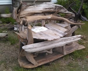 large driftwood bench